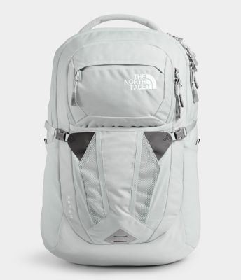 white and grey north face backpack
