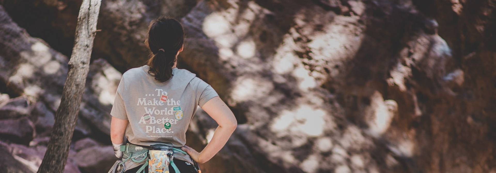 The North Face team athlete Maureen Beck stands with her back turned, wearing a ...To Make the World a Better Place tee.