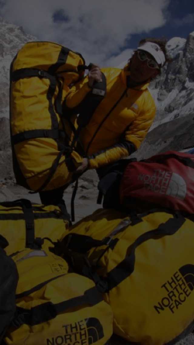 A mountaineer transports his gear in the Himalayas.