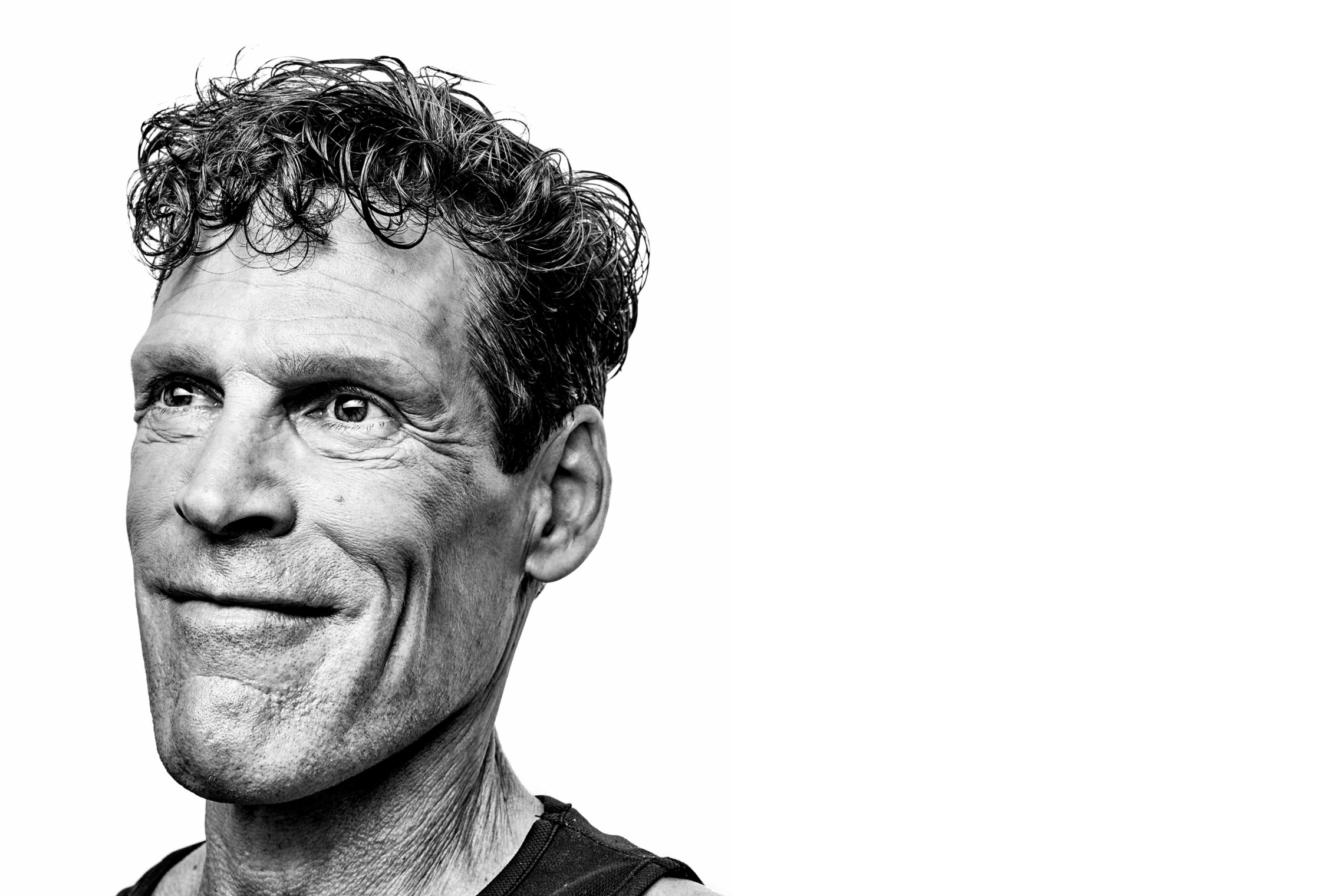 Ultra-runner, Dean Karnazes, is portrayed in a black and white portrait.