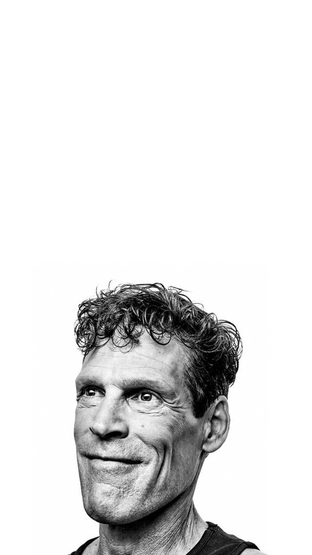Ultra-runner, Dean Karnazes, is portrayed in a black and white portrait.