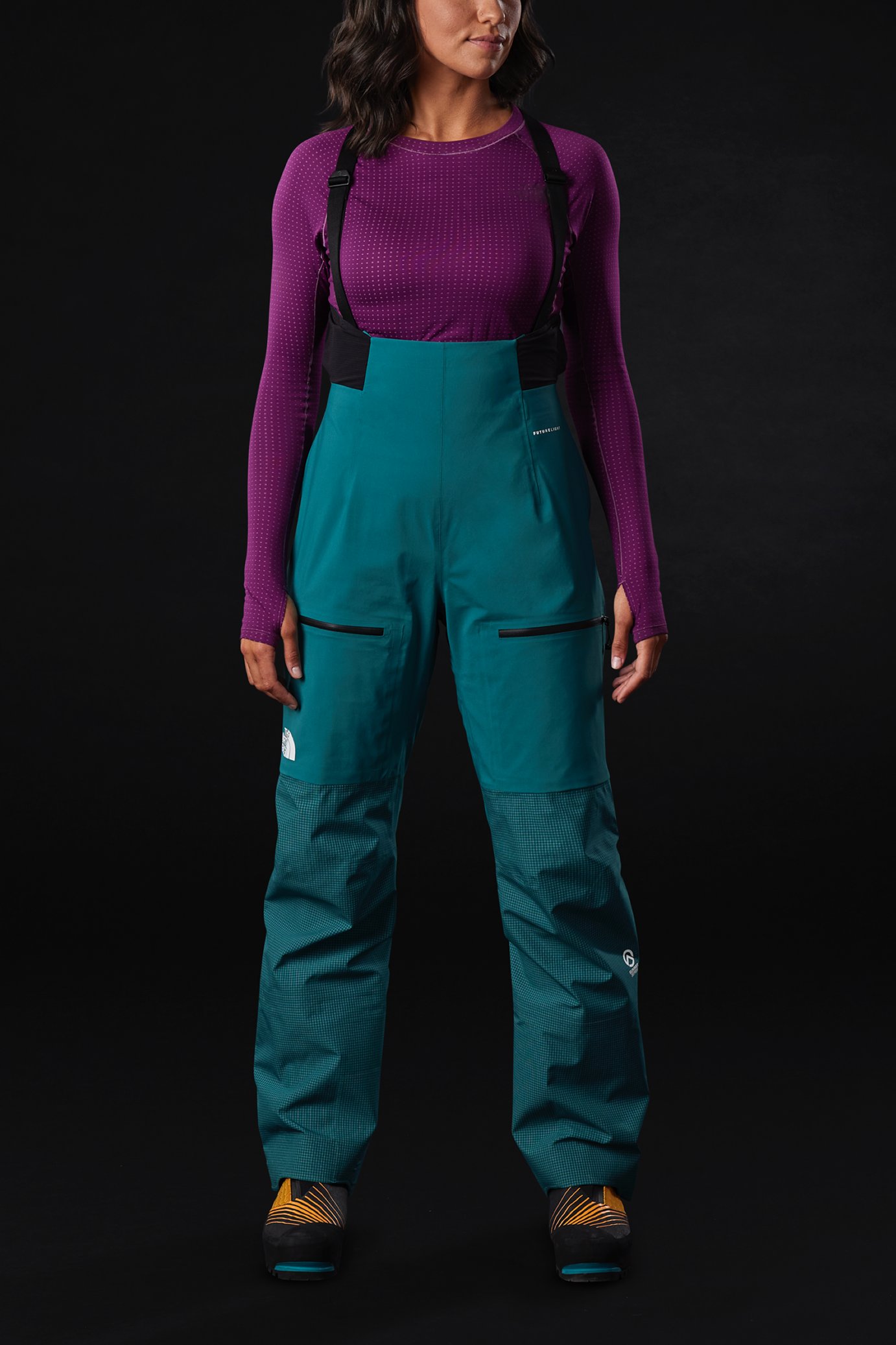 A person wears the Summit L5 FUTURELIGHT Full Zip Bib. A bib with an ergonomic and form-fitting design.
