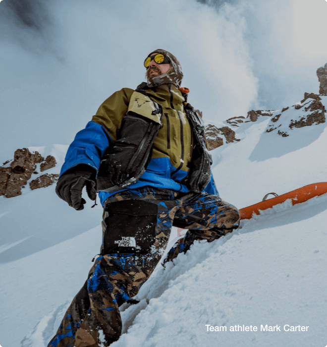 The North Face teamathlete Mark Carter snowboards in Summit Series gear.