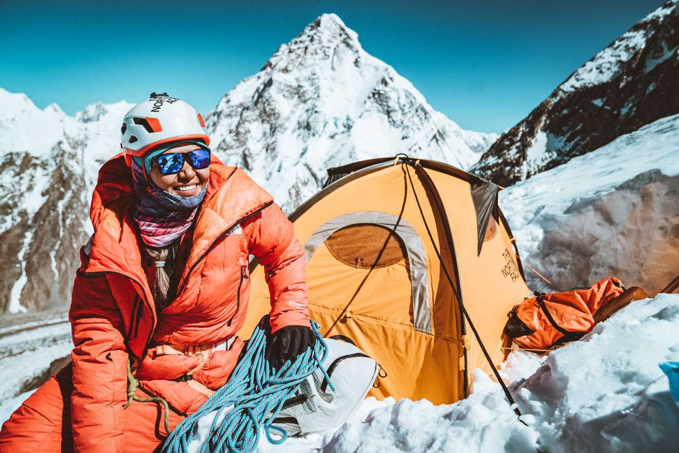 Athlete Dawa Yangzum Sherpa wears the Himalayan Suit from The North Face on Broad Peak.